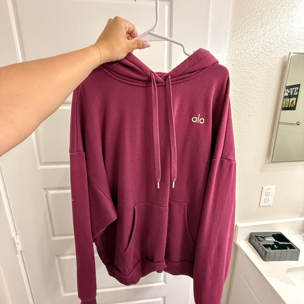 ALO Yoga Women's Hoodie (in color Wild Berry)